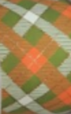 2.5" X 10 YARD ORANGE WHITE PLAID ON GREEN RIBBON